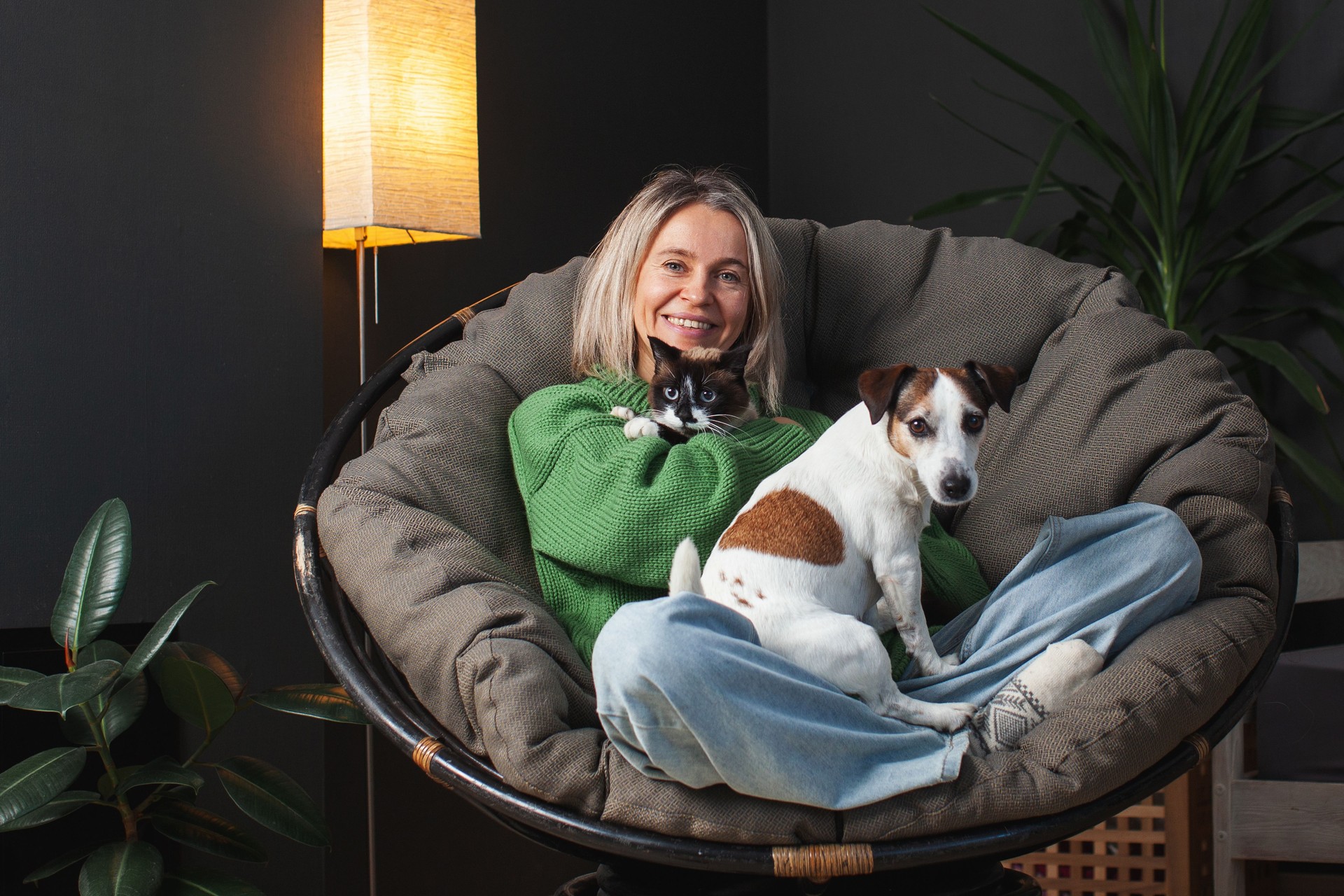 Woman Spending day with her Dog and Cat at Home